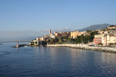 Sea by bastia against blue sky