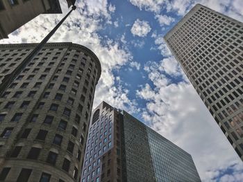 Low angle view of skyscrapers against sky