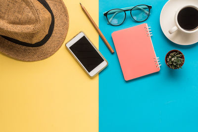 High angle view of mobile phone on table
