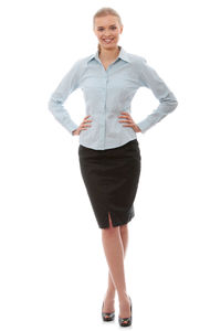 Portrait of a smiling young woman against white background