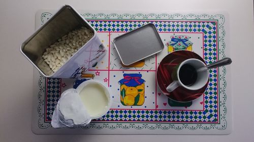 High angle view of coffee cup on table