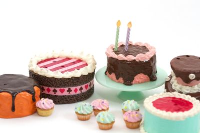 Close-up of cupcakes against white background