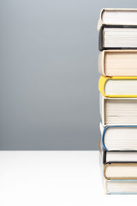 Close-up of books against gray background