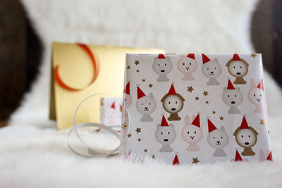 Close-up of gifts on table during christmas