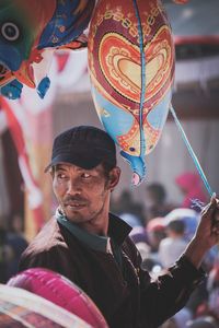 Man holding balloon