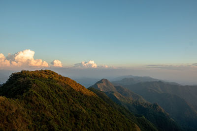 Scenic view of mountains against sky during sunset