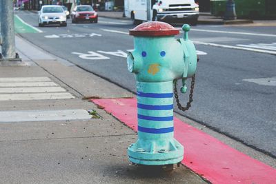 Close-up of fire hydrant on street