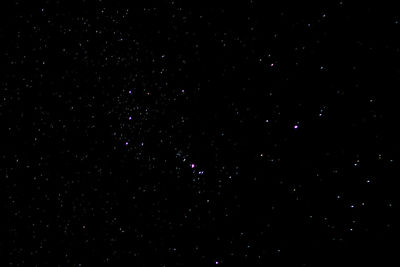 Low angle view of star field against sky at night