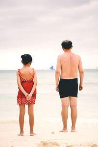People standing on beach