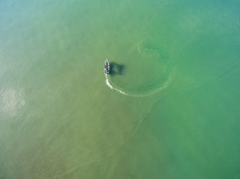 Directly above shot of boat sailing in sea