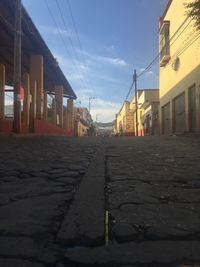 Street in town against sky