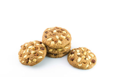 Close-up of cookies against white background