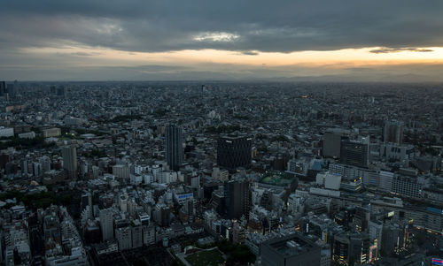 High angle view of city against sky during sunset