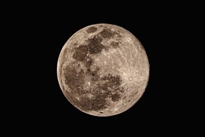 Low angle view of moon against sky at night