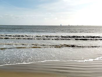 Scenic view of beach against sky