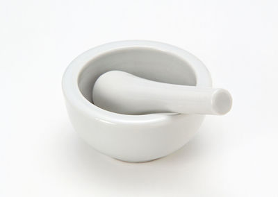 High angle view of empty coffee against white background