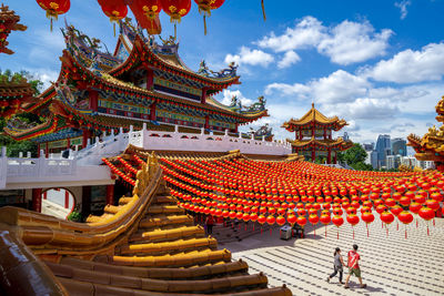 Traditional temple against building