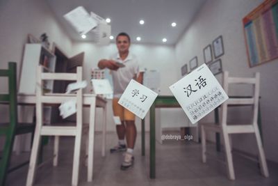 Woman standing in corridor