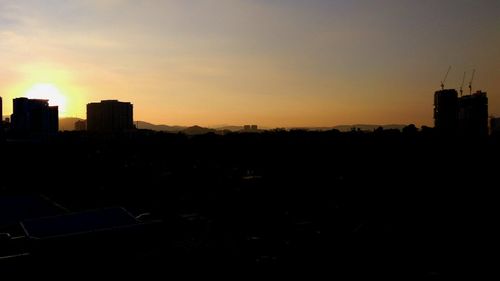 View of cityscape at sunset