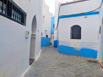 Alley amidst buildings in city