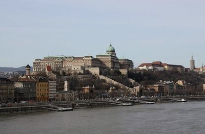 View of river with buildings in background