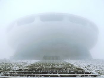 Building in city during foggy weather