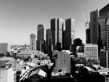 High angle view of buildings against clear sky