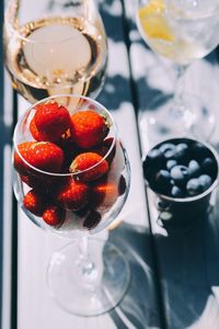 Close-up of strawberries on glass table