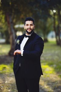 Portrait of smiling groom