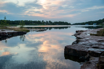 Scenic view of lake against sky during sunset