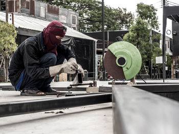 Man working on metal structure