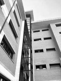 Low angle view of modern building against clear sky