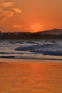 View of calm sea at sunset