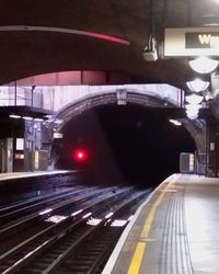 Railroad station platform at night