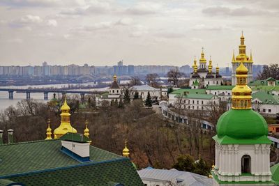 Panoramic view of buildings against sky in city