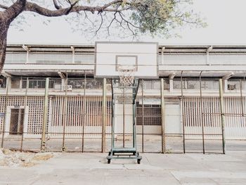 Basketball hoop against building