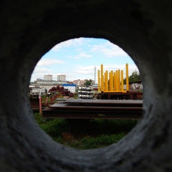 Buildings seen through hole in city