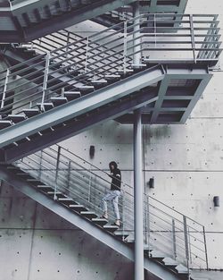 Man walking on staircase