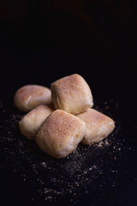 Close-up of eggs on black background