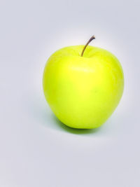 Close-up of apple against white background