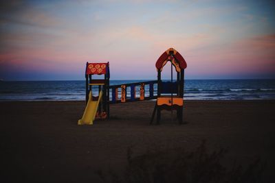 Scenic view of sea at sunset