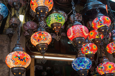 Low angle view of lanterns hanging at market stall