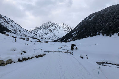 Snow covered mountain against sky