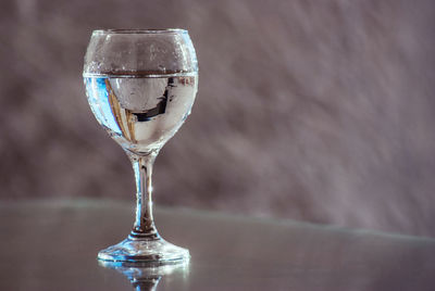 Close-up of wine glass on table