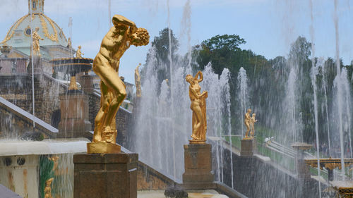 Panoramic shot of statue against fountain
