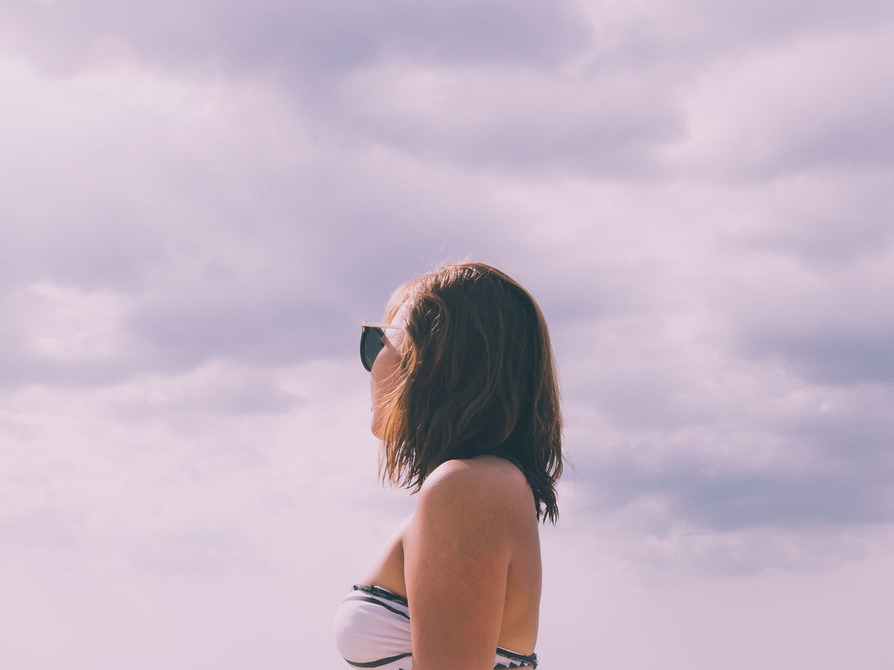 cloud - sky, sky, one person, real people, adult, leisure activity, rear view, women, lifestyles, hairstyle, nature, beauty in nature, standing, hair, young women, portrait, outdoors, day, waist up, purple, looking at view