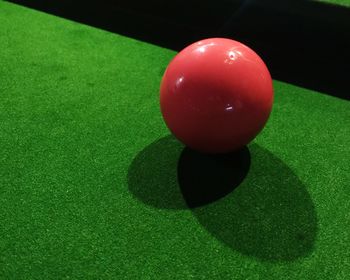 Close-up of red balls on table