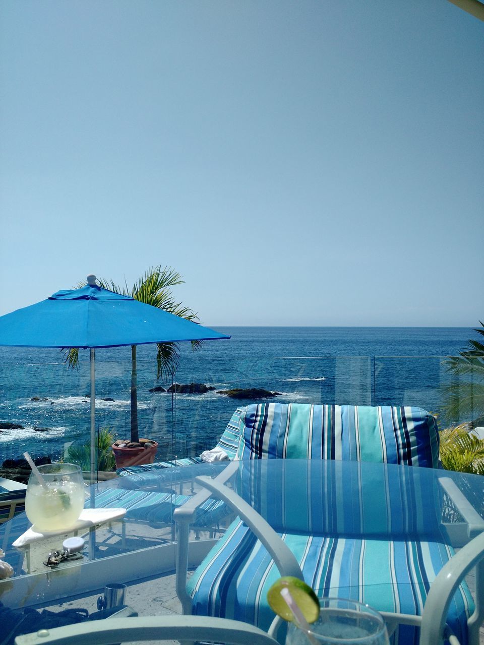 SCENIC VIEW OF SWIMMING POOL AGAINST CLEAR SKY