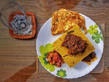 High angle view of food served on table