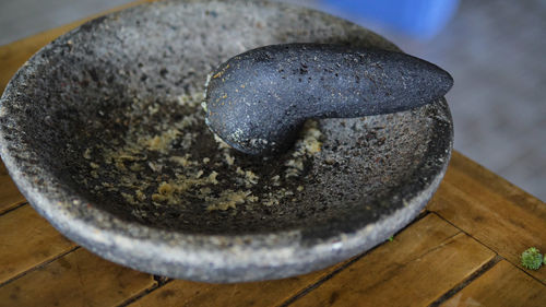 High angle view of mortar and pestle